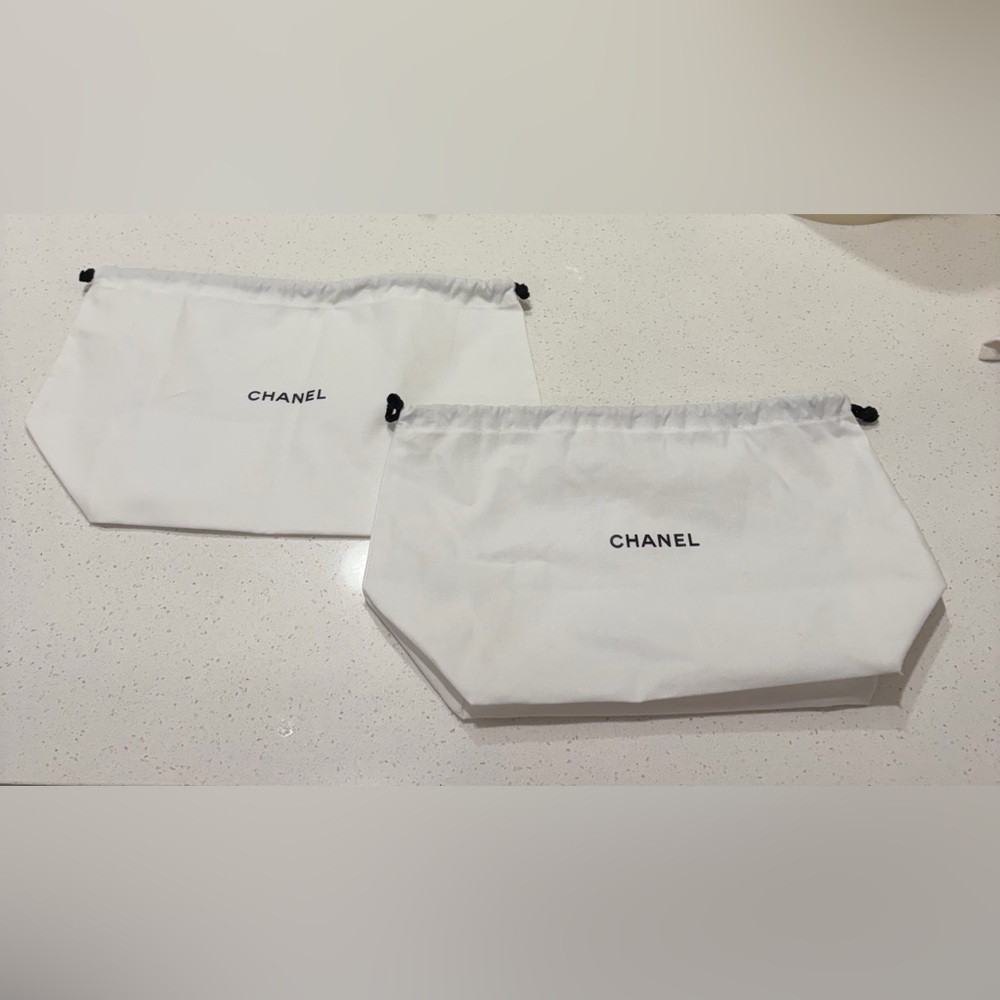 CHANEL White Drawstring Bags